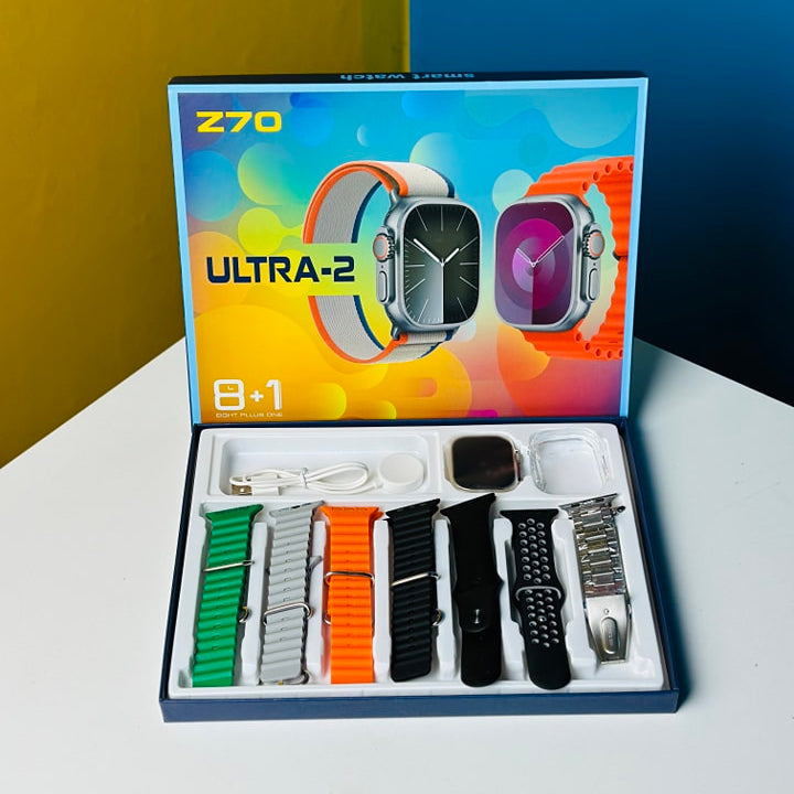 Z70 Ultra-2 smartwatch unboxed showing silver watch with 8+1 straps - green, gray, orange, black, perforated black, steel - in premium gift box