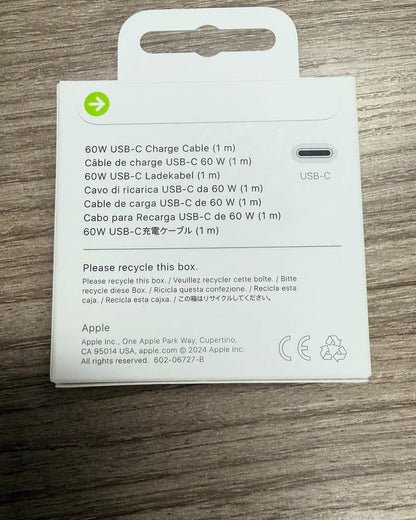 Apple USB-C 60W Charge Cable 1m original box back view showing multilingual product name and Apple Inc details