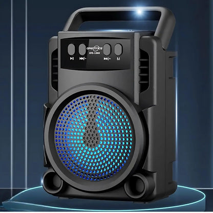 Greatnice GTS-1360 portable Bluetooth speaker dramatic dark blue background showing RGB LED light show and top control buttons