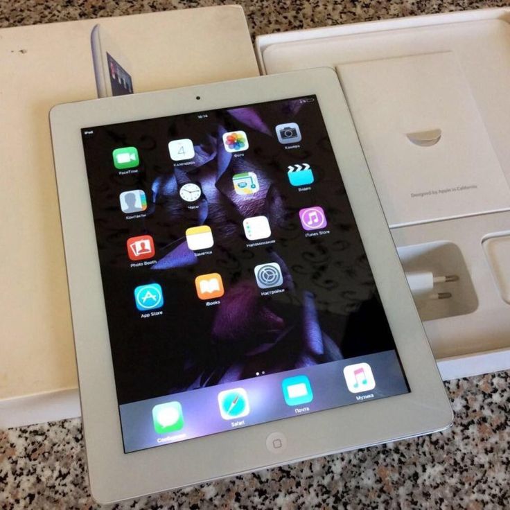 Apple iPad 3rd Generation white front view showing iOS home screen with apps and original box