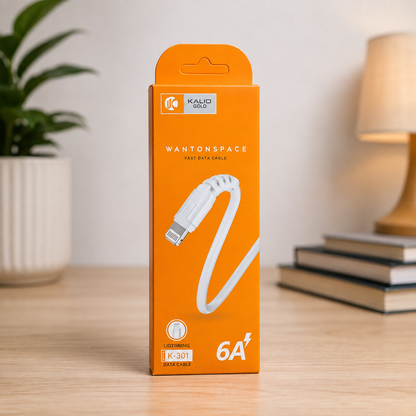 Wantonspace K-301 Lightning 6A fast data cable orange retail box standing on wooden desk with plant and lamp in background